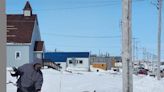 This Coral Harbour, Nunavut, man travels by dog sled to fix the local phone lines