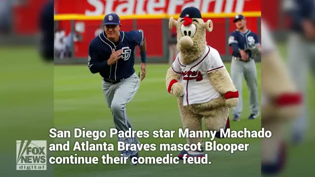 Video: Braves mascot Blooper tricks Manny Machado into signing