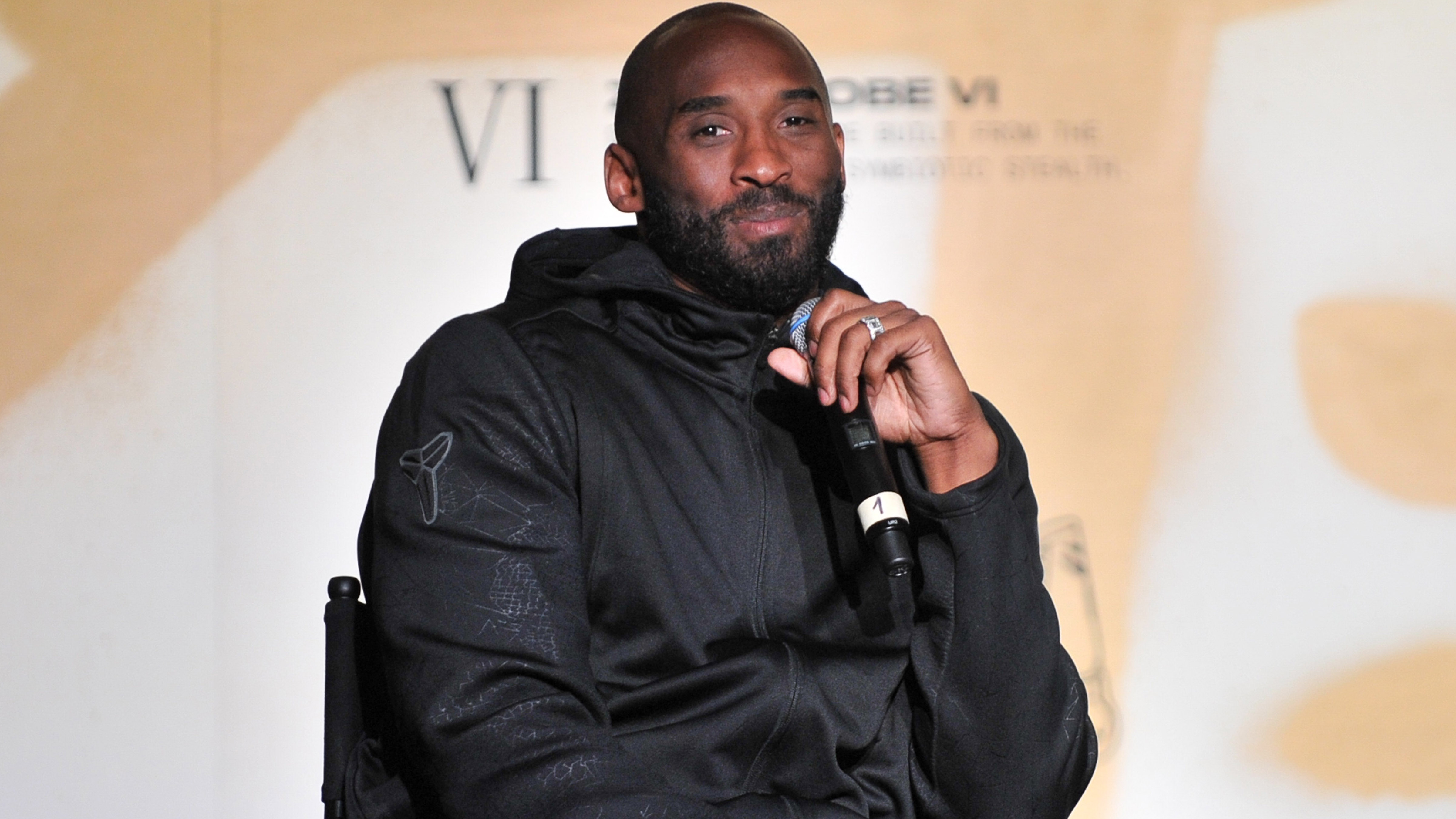Kobe Bryant dons casual all-Nike outfit while carrying 18-month-old  daughter out of hotel in Paris