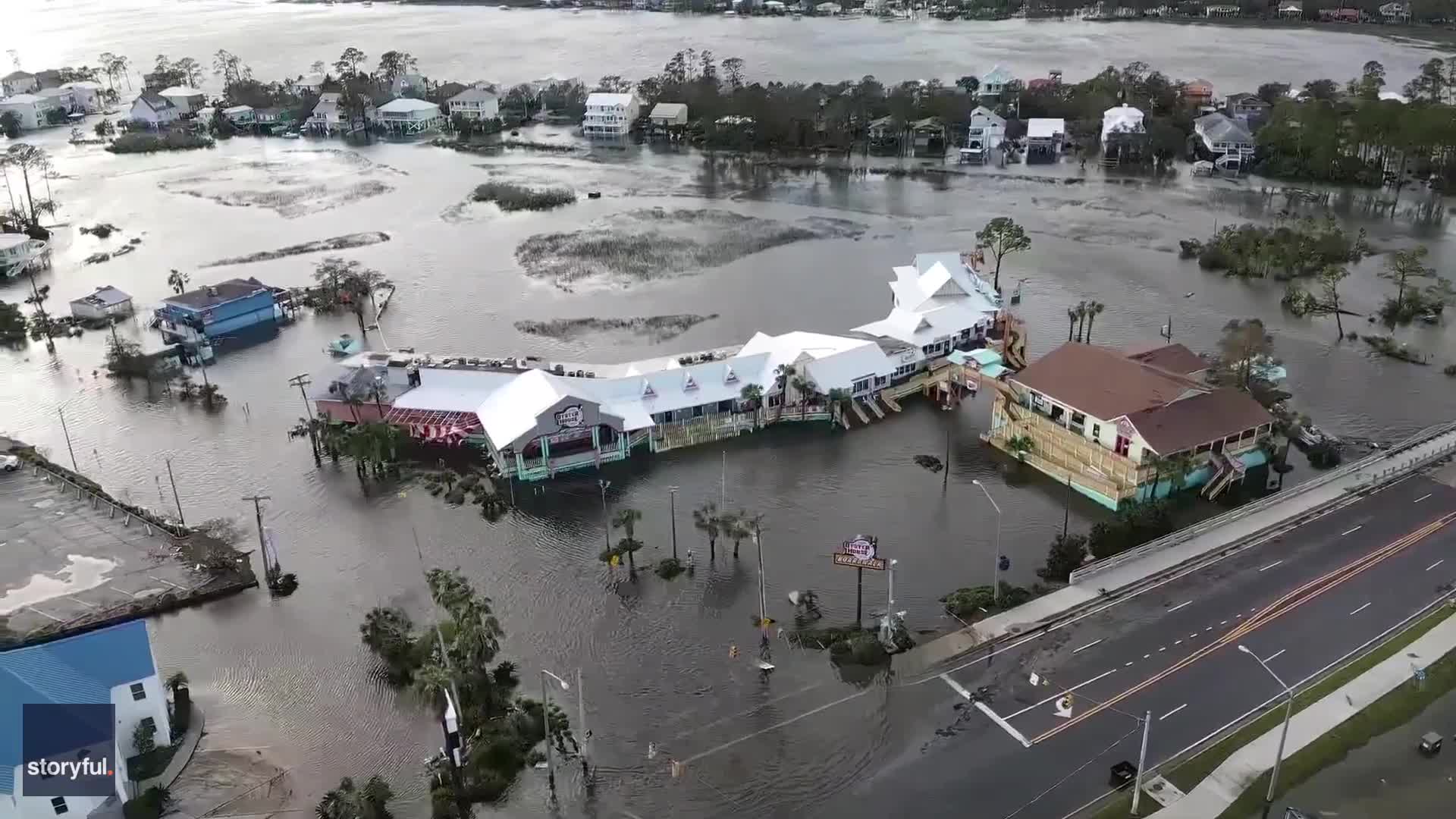 Kayakers Paddle Along in Flooded Gulf Shores Streets in the Aftermath