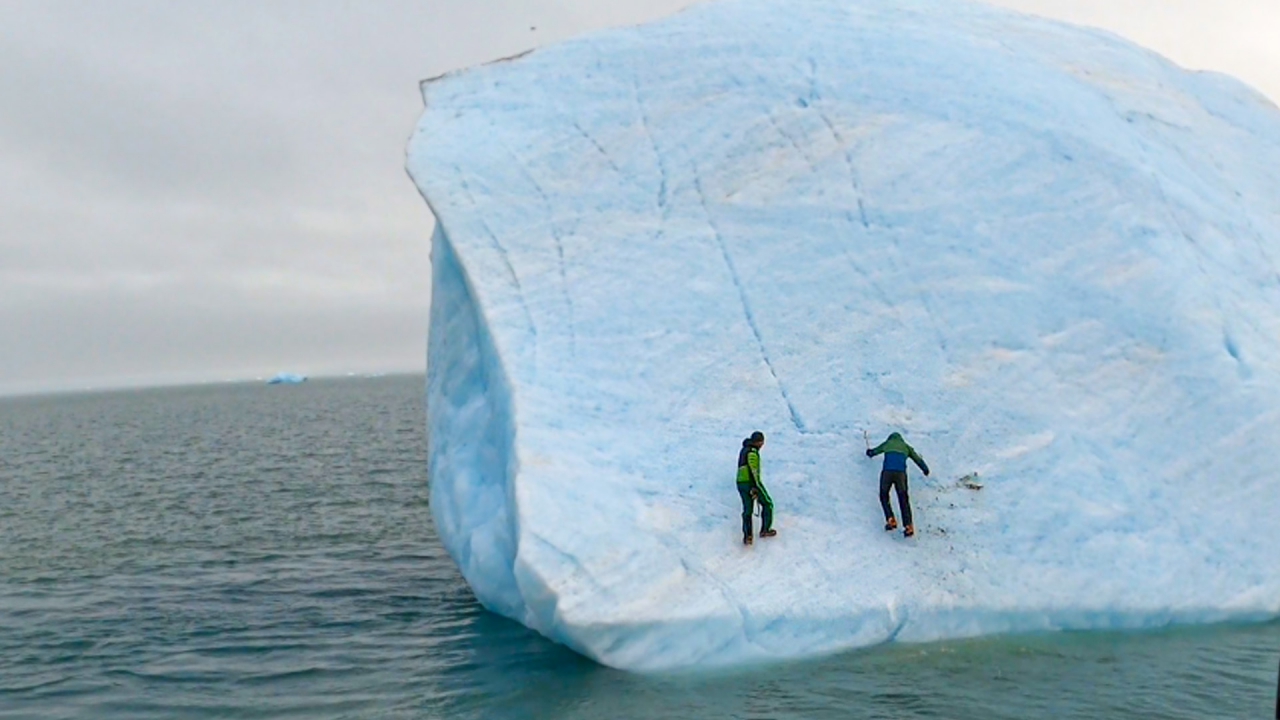 Giant iceberg flips over on intrepid explorers