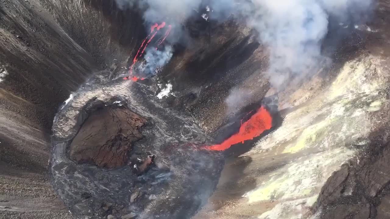 Aerial Footage Shows Lava From Kilauea Volcano Flowing Into Crater Lake