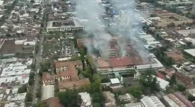 Aerial Footage Shows Smoke Rising From Hospital Fire in Santiago