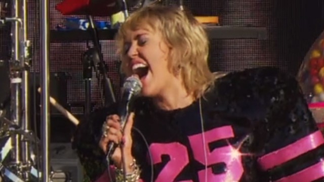 Miley Cyrus Overcomes With Emotion During ‘Wrecking Ball’ Performance At Super Bowl Tailgate Show