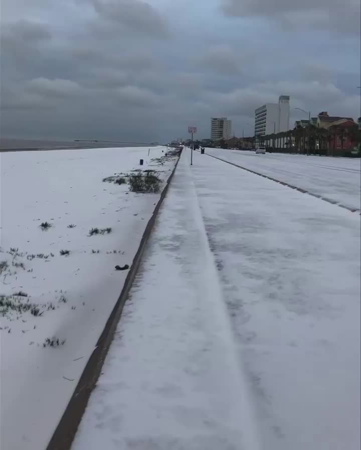 Snow Covers Galveston Beach as Winter Storm Brings Record Low