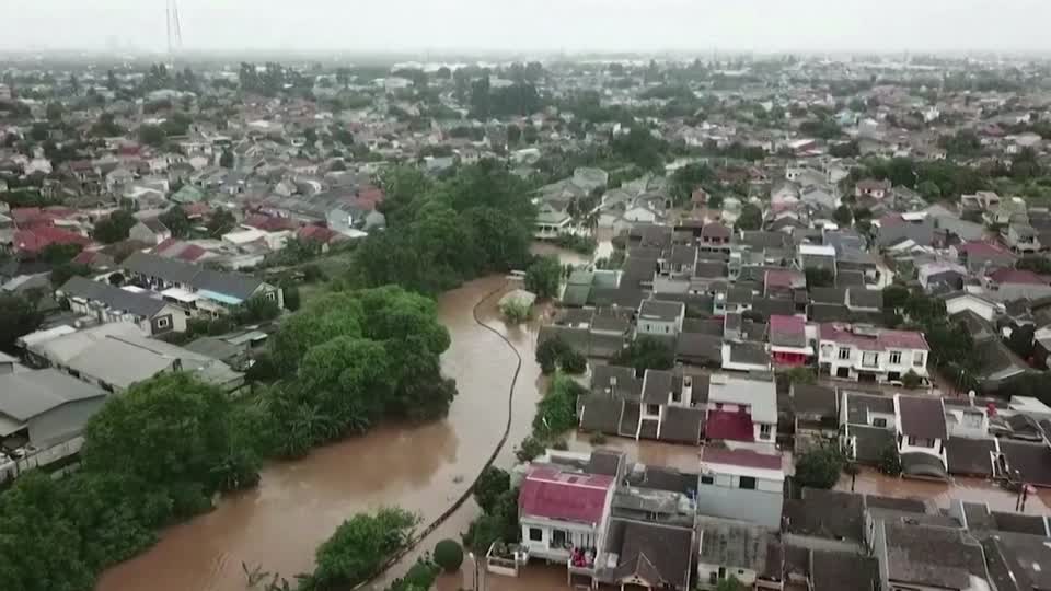 Drone footage of flood-hit Indonesian capital - Yahoo News