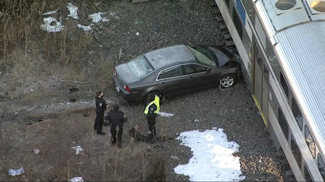 The Metra train hits the car at Wheeling;  expected delays