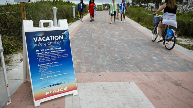 The CDC recommends caution on spring break travel, as states abandon COVID restrictions