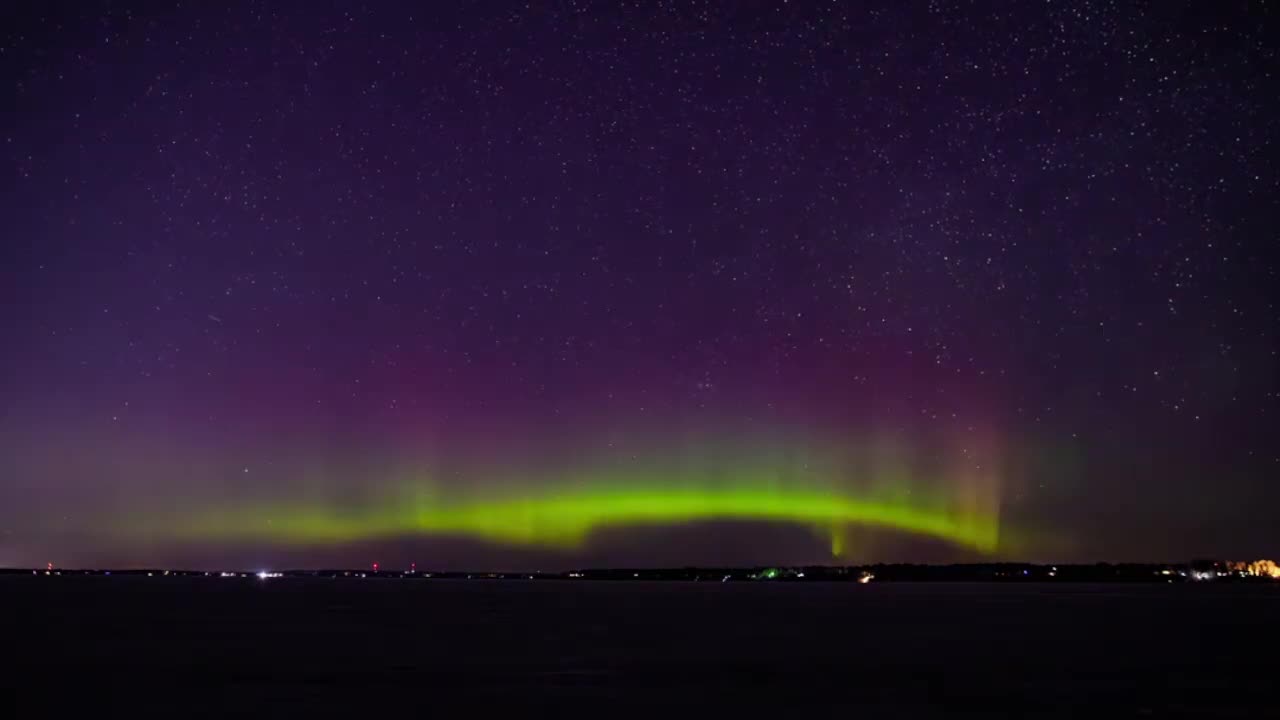 Aurora Borealis Glimmers Over Northern Wisconsin