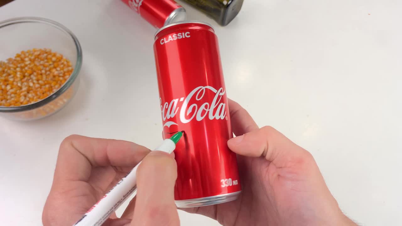 You can make a popcorn machine out of Coca-Cola cans.