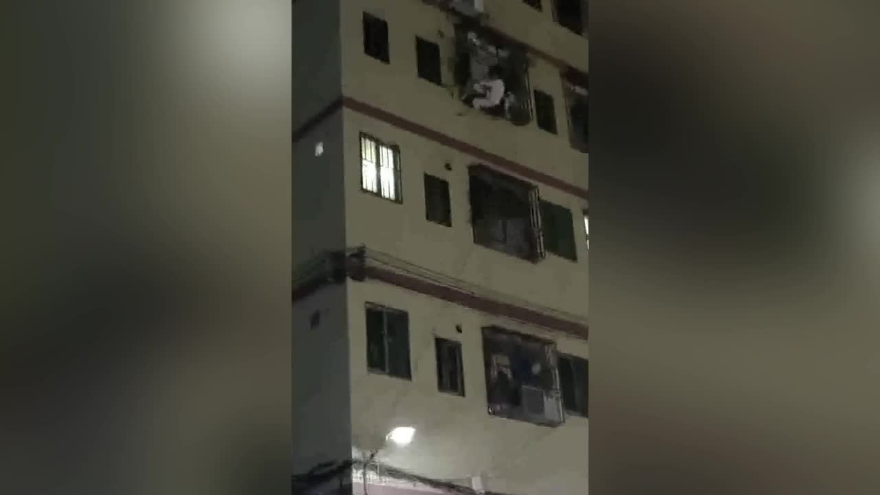 girl falling off building