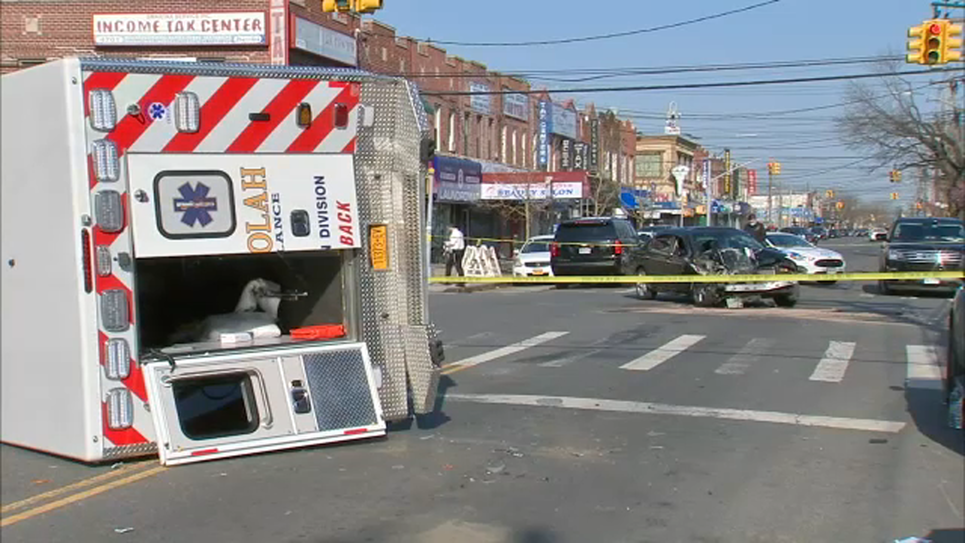 Woman killed in ambulance, 8 others injured in NYC