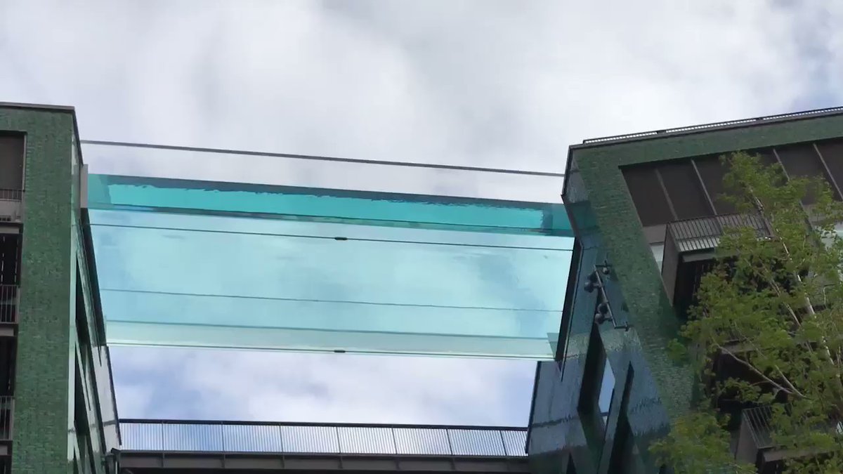 See Through Sky Pool Spans Apartment Buildings At London Development