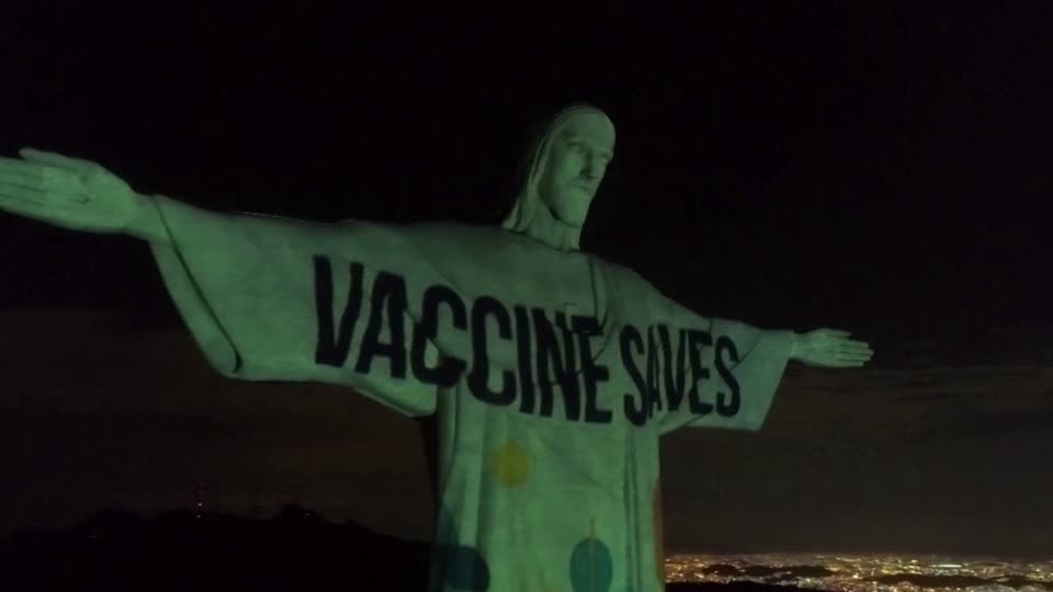 Christ The Redeemer Lit Up With Vaccine Message