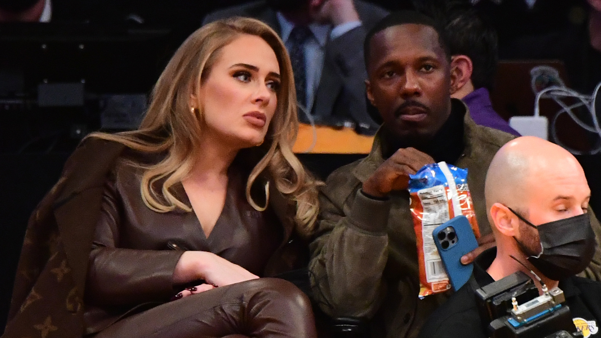 Adele stuns in leather jumpsuit as she sits courtside at Lakers game with  boyfriend Rich Paul