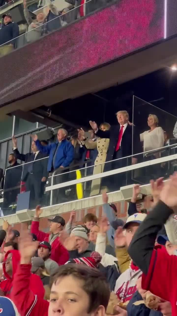 Donald Trump does tomahawk chop with Braves fans at World Series