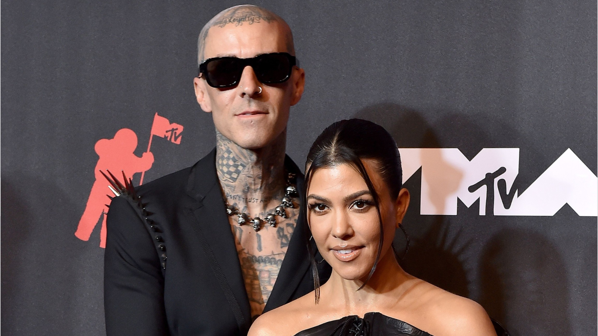 Kourtney Kardashian Goes Raunchy As She Sits On Travis Barker's Lap In  Public At Simon Huck's Wedding - See Viral Video!