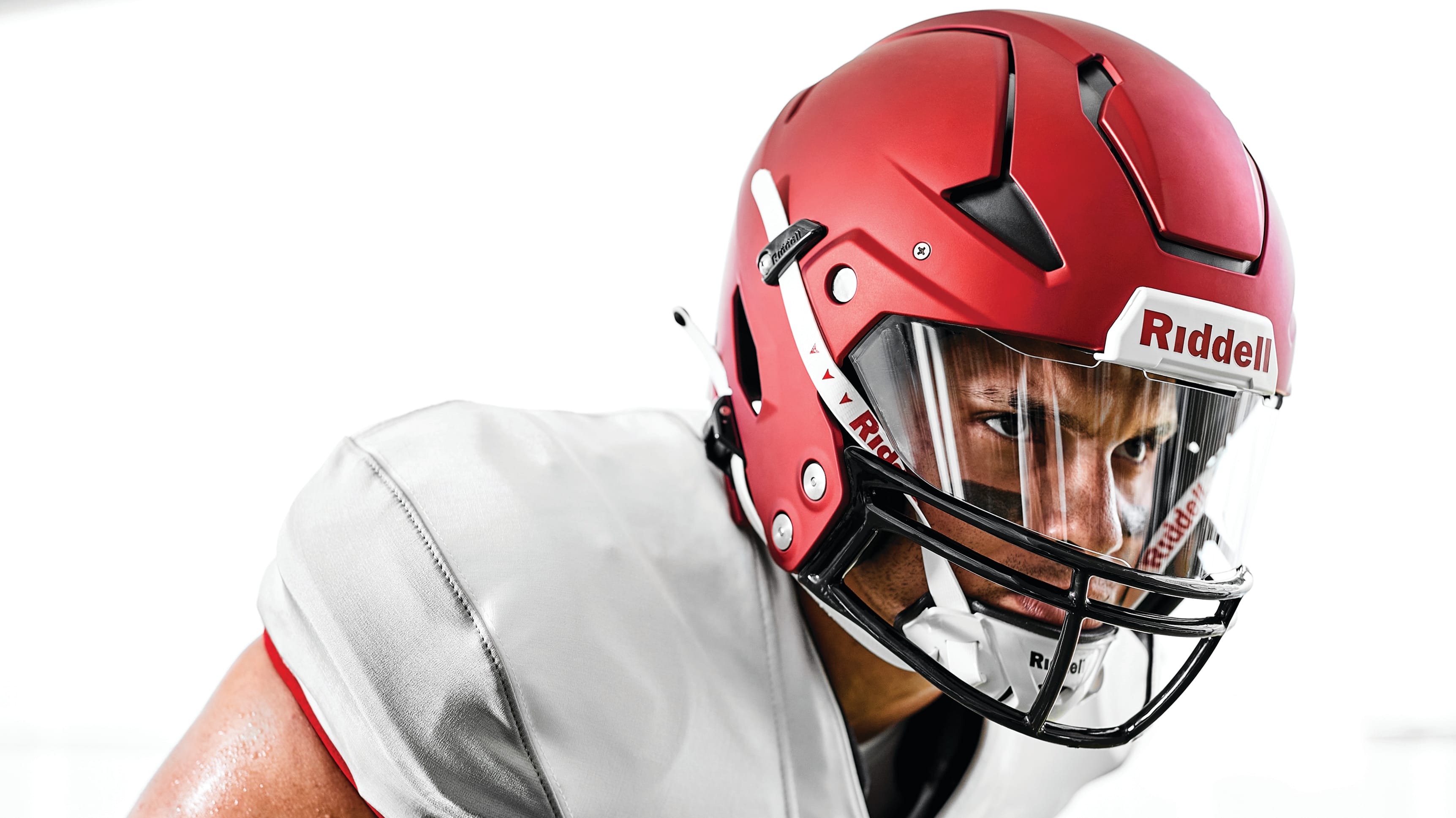 Why Riddell removed part of the facemask to increase safety in new Axiom  football helmet