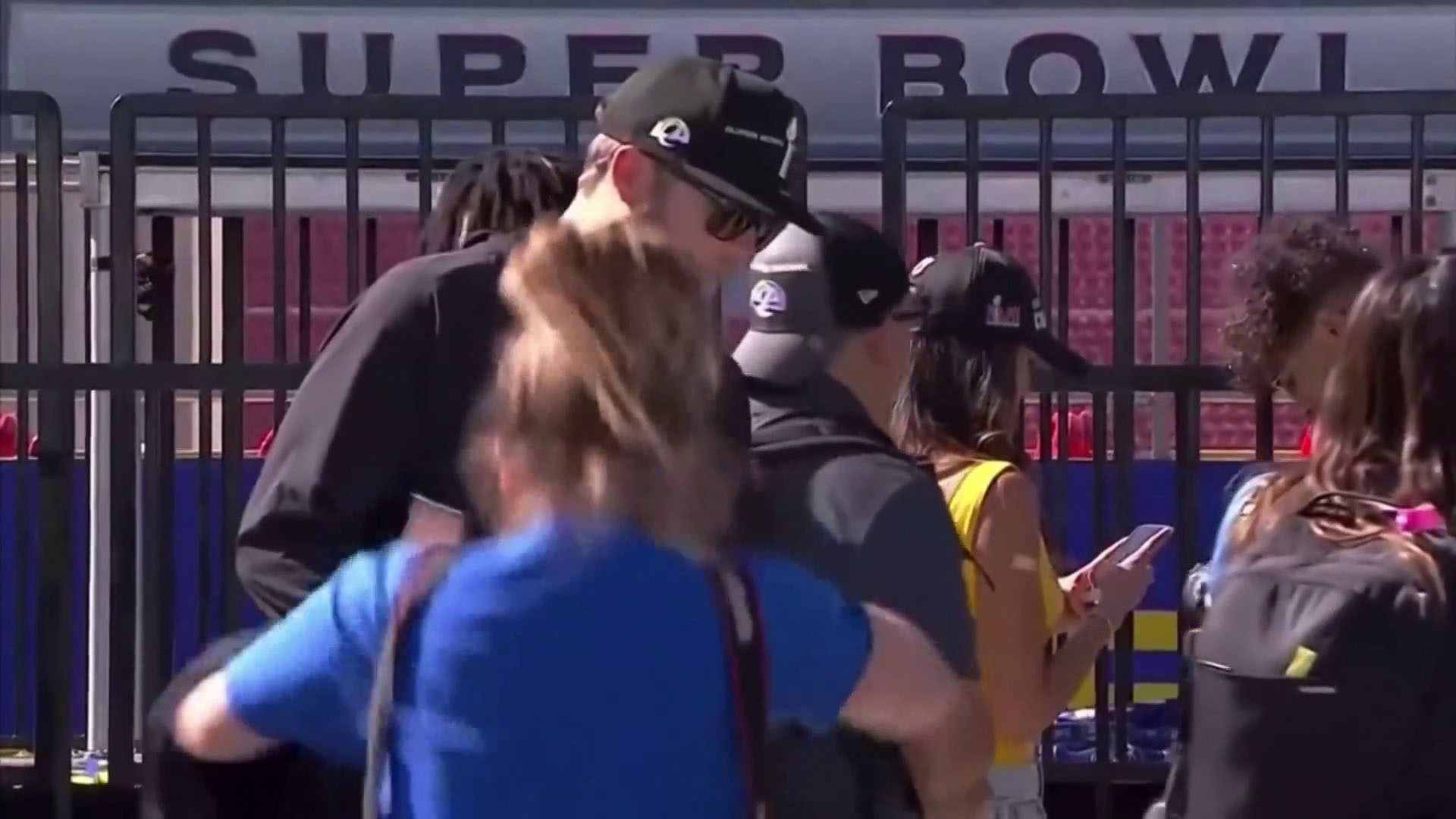 Matthew Stafford turns away as Rams parade photographer falls