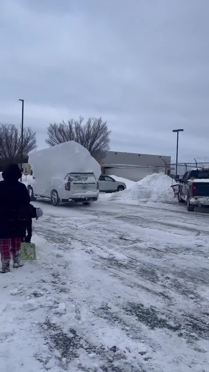 Bills players have to dig out their cars as they arrive back to find them  submerged in snow