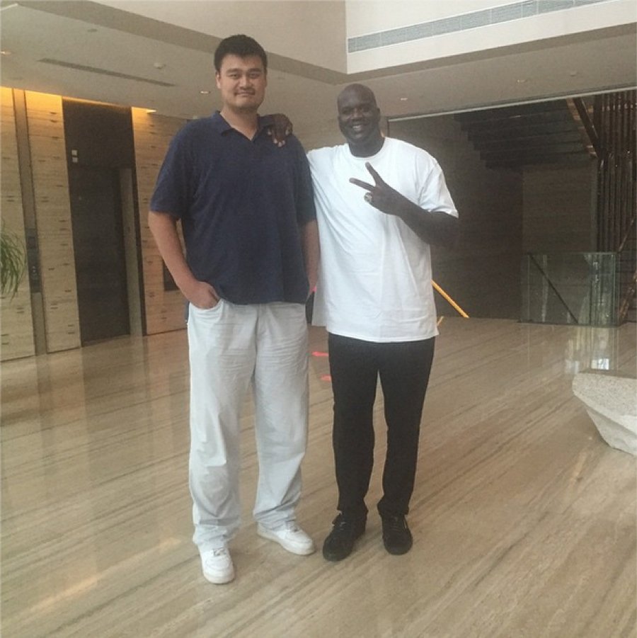 Photo Of Yao Ming Making Shaq Look Short Really Puts Yao Ming's Height In Perspective.