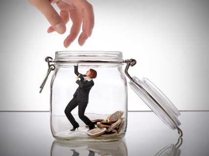 Guy Sits On Glass Jar