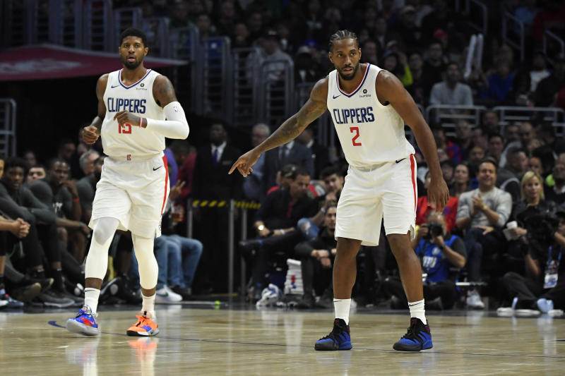 The Clippers looked to familiar faces down the stretch in a thrilling victory over the Celtics in their first game with Kawhi Leonard and Paul George on the floor. (AP Photo/Mark J. Terrill)