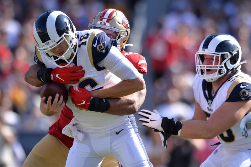 Oct 13, 2019; Los Angeles, CA, USA; Los Angeles Rams quarterback Jared Goff (16) is sacked by San Francisco 49ers defensive end Solomon Thomas (94) during the second half at Los Angeles Memorial Coliseum. Mandatory Credit: Orlando Ramirez-USA TODAY Sports