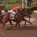 ADVANCE FOR WEEKEND EDITIONS, MAY 23-24 - FILE - In this June 6, 1998, file photo, Victory Gallop (11), with Gary Stevens up, edges out Real Quiet, with Kent Desormeaux up, as they cross the finish line in the 130th running of the Belmont Stakes at Belmont Park in Elmont, N.Y. (AP Photo/Bill Kostroun, File)