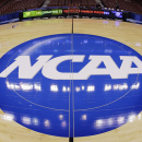 While feds get tough on recruiting scandal, NCAA forms a committee