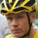 Britain's Christopher Froome, wearing the overall leader's yellow jersey, waits for the start of the eighth stage of the Tour de France cycling race over 181.5 kilometers (112.8 miles) with start in Rennes and finish in Mur-de-Bretagne, France, Saturday, July 11, 2015. (AP Photo/Christophe Ena)