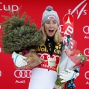 Nov 29, 2015; Aspen, CO, USA; Mikaela Shiffrin of the United States celebrates on the podium after winning the women's slalom race at the FIS alpine skiing World Cup at Aspen Snowmass. Mandatory Credit: Jeff Swinger-USA TODAY Sports