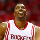 HOUSTON, TX - MAY 25: Dwight Howard #12 of the Houston Rockets wears a ripped jersey in the second quarter against the Golden State Warriors during Game Four of the Western Conference Finals of the 2015 NBA Playoffs at Toyota Center on May 25, 2015 in Houston, Texas. (Photo by Ronald Martinez/Getty Images)