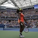 Serena Williams of the U.S. walks on the court as she plays Roberta Vinci of Italy during their women's singles semi-final match at the U.S. Open Championships tennis tournament in New York, September 11, 2015.   REUTERS/Shannon Stapleton