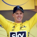 Cycling - Tour de France cycling race - The 184-km (114,5 miles) Stage 8 from Pau to Bagneres-de-Luchon, France - 09/07/2016 - Team Sky rider Chris Froome, new yellow jersey leader, reacts on the podium after winning the stage.  REUTERS/Juan Medina