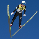 Akito Watabe, Japan, soars during the final World Cup Nordic Combined event of the season in the Holmenkollen Ski Arena in Oslo Saturday March 14, 2015. Watabe won the final event of the season. (AP Photo/Jon Olav Nesvold / NTB scanpix)