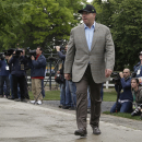 Ahmed Zayat, owner of Kentucky Derby and Preakness Stakes winner American Pharoah, walks to the barn after the horse's workout at Belmont Park, Thursday, June 4, 2015, in Elmont, N.Y. American Pharoah will try for a Triple Crown when he runs in Saturday's 147th running of the Belmont Stakes horse race. (AP Photo/Julie Jacobson)