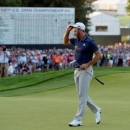 Jun 19, 2016; Oakmont, PA, USA; Dustin Johnson removes his cap after winning the U.S. Open golf tournament at Oakmont Country Club. Mandatory Credit: Michael Madrid-USA TODAY Sports