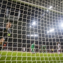 Ireland's John O'Shea (C) scores the equalizer past Germany's goalkeeper Manuel Neuer (L) during their UEFA Euro 2016 Group D qualifying match in Gelsenkirchen, western Germany on October 14, 2014 (AFP Photo/Odd Andersen)