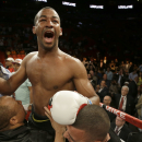 Rances Barthelemy reacts as he hears on on Friday, July 11, 2014, that he has defeated Argenis Mendez in a boxing match begun late Thursday night in Miami. (AP Photo/Wilfredo Lee)