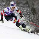 Lindsey Vonn, of the United States, speeds down the course during the first run of an alpine ski, women's World Cup giant slalom race, at the World Cup finals in Meribel, France, Sunday, March 22, 2015. (AP Photo/Shinichiro Tanaka)