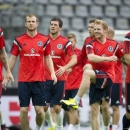 Scotland's players warm up during a training session of the Scottish national football team in Dortmund, western Germany on September 6, 2014 (AFP Photo/John MacDougall)