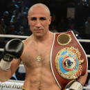 Germany's WBO supermiddleweight champion Arthur Abraham shows his belt after defending his title against his challenger Britain's Paul Smith in Kiel, northern Germany, Saturday evening, Sept. 27, 2014. (AP Photo/dpa, Daniel Reinhardt)