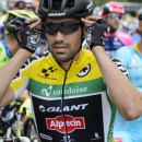 Overall leader Tom Dumoulin from Netherlands of team Giant-Alpecin, waits for the start of the 3rd stage, a 117.3 km race, from Quinto to Olivone, at the 79th Tour de Suisse UCI ProTour cycling race, in the Gotthard Pass, Switzerland, Monday, June 15, 2015. (Jean-Christophe Bott/Keystone via AP)