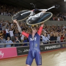 Britain's Sir Bradley Wiggins celebrates breaking the UCI Hour Record at the Olympic Velodrome in Lee Valley Velopark, London, Sunday, June 7, 2015. Former Tour de France winner Bradley Wiggins broke cycling's prestigious hour record, covering 54.526 kilometers (33.88 miles) in 60 minutes. (AP Photo/Tim Ireland)