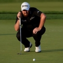 Jun 18, 2016; Oakmont, PA, USA; Shane Lowry lines up a putt on the 11th green during the third round of the U.S. Open golf tournament at Oakmont Country Club. Mandatory Credit: Michael Madrid-USA TODAY Sports