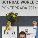 Poland's Michal Kwiatkowski celebrates on the podium of the men's road race over 254.8 kilometers (158.3 miles) of the Road Cycling World Championships in Ponferrada, north-western Spain, Sunday Sept. 28, 2014. (AP Photo/Daniel Ochoa de Olza)