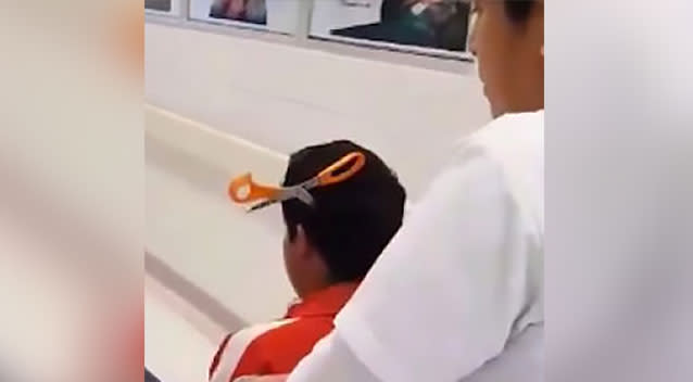 Teacher suspended after schoolboy gets scissors stuck in his head ScissorsSL