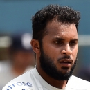 England's cricketer Adil Rashid tosses a ball during a training session at the Grenada National Stadium in Saint George's on April 20, 2015 (AFP Photo/Jewel Samad)