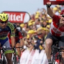 Lotto-Soudal rider Andre Greipel of Germany (R) celebrates as he wins ahead of Tinkoff-Saxo rider Peter Sagan of Slovakia (L) at the 166-km (103.15 miles) second stage of the 102nd Tour de France cycling race from Utrecht to Zeeland, July 5, 2015. REUTERS/Benoit Tessier